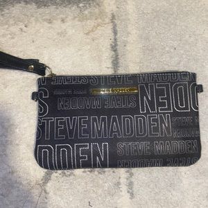 Steve Madden, never used, attached phone charger and usb